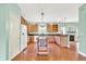 Spacious kitchen with hardwood floors, kitchen island, and wooden cabinets at 7380 N 225 W, Lebanon, IN 46052