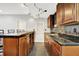 Finished basement featuring a kitchenette with cherry cabinets, and granite counters at 7380 N 225 W, Lebanon, IN 46052