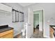 Laundry room with shelving, drying rack, and views into hallway at 7380 N 225 W, Lebanon, IN 46052