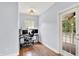 Cozy office space with a desk setup, natural light, and access to the porch at 7380 N 225 W, Lebanon, IN 46052