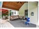 Covered patio with outdoor seating and view of pool at 7380 N 225 W, Lebanon, IN 46052