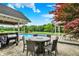 Backyard pool area with a dining table and chairs, perfect for entertaining at 7380 N 225 W, Lebanon, IN 46052