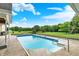 Inviting backyard pool surrounded by lush greenery and ample space for relaxation at 7380 N 225 W, Lebanon, IN 46052