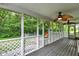 Relaxing screened-in porch overlooking the treed backyard and chicken coop at 7380 N 225 W, Lebanon, IN 46052