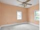 Bedroom with neutral walls, carpeting and a ceiling fan at 914 English Ave, Indianapolis, IN 46203