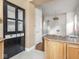 Kitchen showing an eat-in island and an antique hutch at 914 English Ave, Indianapolis, IN 46203