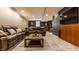 Relax in this finished basement with comfortable seating, a TV, and stylish decor at 9804 Wentworth Ct, Carmel, IN 46032