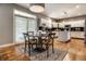 Kitchen/dining area showcasing counter seating and generous space at 9804 Wentworth Ct, Carmel, IN 46032