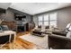 Relaxing living area with a fireplace and ample seating at 9804 Wentworth Ct, Carmel, IN 46032
