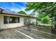 Wide shot of the wooden back deck with picnic table that is just off the main house at 101 Heiny Rd, Indianapolis, IN 46217