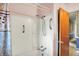 Shower-tub with handrails, showerhead, and shower curtain, offering accessibility and convenience at 101 Heiny Rd, Indianapolis, IN 46217