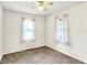 A sunny bedroom with windows and carpeted floor, offering a comfortable living space at 101 Heiny Rd, Indianapolis, IN 46217