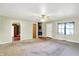 Bright living room with neutral carpet, light green walls, and natural light at 101 Heiny Rd, Indianapolis, IN 46217