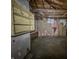 This attic has exposed wood and unfinished walls at 1140 Mcdougal St, Indianapolis, IN 46203