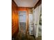 Hallway features wood paneling with the furnace in the corner at 1140 Mcdougal St, Indianapolis, IN 46203
