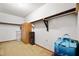 Spacious walk-in closet featuring shelving and a cabinet for optimal storage at 1212 Woodlawn Ave, Indianapolis, IN 46203