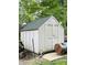 Well-kept shed with secure doors, providing ample storage space at 125 W Church St, Thorntown, IN 46071