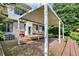 Spacious backyard deck with a modern pergola and outdoor seating attached to the home at 1410 Shadow Ct, Zionsville, IN 46077
