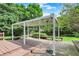 Lovely backyard deck and pergola with built-in benches and outdoor lighting at 1410 Shadow Ct, Zionsville, IN 46077