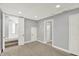 Finished basement with new carpeting and access to a full bathroom, stairs, and storage room at 1410 Shadow Ct, Zionsville, IN 46077