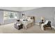 Serene main bedroom featuring a large window and comfortable seating area at 1410 Shadow Ct, Zionsville, IN 46077