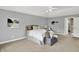 Spacious main bedroom with vaulted ceilings and neutral tones at 1410 Shadow Ct, Zionsville, IN 46077