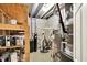 Utility room featuring a water heater, water softener, shelving, and other mechanical systems at 1410 Shadow Ct, Zionsville, IN 46077