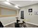 Simple music room featuring a drum set and framed musical decor on the walls at 15023 Glenmoor Cir, Carmel, IN 46033