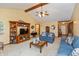 Spacious living room offering comfortable seating, wood accents and bright, natural light at 1607 Michelle Manor, Danville, IN 46122