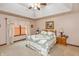 Spacious main bedroom features a tray ceiling and neutral decor at 1607 Michelle Manor, Danville, IN 46122