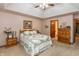 Bright main bedroom with soft, neutral walls and carpet at 1607 Michelle Manor, Danville, IN 46122