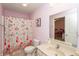 Charming bathroom featuring a shower, toilet, vanity, and stylish décor at 1661 Devonshire Ave, Avon, IN 46123