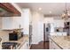 Stylish kitchen with stainless steel appliances, granite countertops, and custom cabinets at 1661 Devonshire Ave, Avon, IN 46123