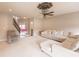 Spacious living room with a comfortable sectional sofa and view of the foyer at 1661 Devonshire Ave, Avon, IN 46123