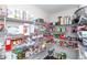 Spacious walk-in pantry with ample shelving for organized storage of food items and kitchen essentials at 1661 Devonshire Ave, Avon, IN 46123