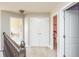Neutral upstairs hallway showcases white doors, neutral paint, and carpet flooring at 1661 Devonshire Ave, Avon, IN 46123