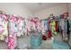Large walk-in closet equipped with ample hanging storage and shelving for optimal organization at 1661 Devonshire Ave, Avon, IN 46123