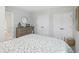 Comfortable bedroom featuring neutral tones, a dresser, and double closets at 17551 Gruner Way, Westfield, IN 46062