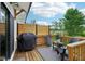 Outdoor deck complete with grill, stylish patio furniture, and a peaceful view of the yard at 17551 Gruner Way, Westfield, IN 46062