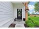 Inviting front door entrance with stylish accents and lush landscaping at 17551 Gruner Way, Westfield, IN 46062