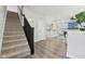 Open living area with stairs, wood floors, and contemporary design at 17551 Gruner Way, Westfield, IN 46062