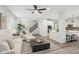Open concept living space boasts hardwood floors, neutral paint, and plenty of natural light at 17551 Gruner Way, Westfield, IN 46062