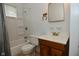 Bathroom features a shower/tub combination, vanity, and a single window at 1802 Sugar Grove Ave, Indianapolis, IN 46202
