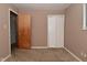 Bedroom featuring carpet and closet, and neutral colored walls at 1802 Sugar Grove Ave, Indianapolis, IN 46202