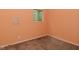 Bedroom featuring neutral carpet and peach painted walls and one window at 1802 Sugar Grove Ave, Indianapolis, IN 46202