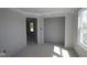 Sun-filled bedroom with crisp walls, a closet and a window view at 1813 Real St, Indianapolis, IN 46240