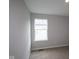A light and airy bedroom filled with natural light from the window at 1813 Real St, Indianapolis, IN 46240
