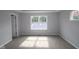 Spacious main bedroom with neutral color palette and ample natural light at 1813 Real St, Indianapolis, IN 46240