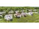 Aerial of suburban homes with manicured lawns and mature trees offering a peaceful neighborhood setting at 1821 Midnight Pass, Brownsburg, IN 46112