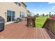 Enjoy outdoor living on this back deck with chairs and views of the well-manicured backyard at 1821 Midnight Pass, Brownsburg, IN 46112